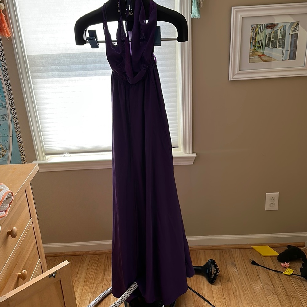Open back with ties on back. Purple EEUC dress
